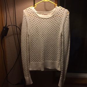 White knitted long sleeved sweater